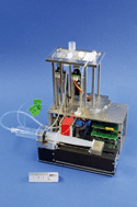 Graphical abstract: Integrated DNA and RNA extraction and purification on an automated microfluidic cassette from bacterial and viral pathogens causing community-acquired lower respiratory tract infections