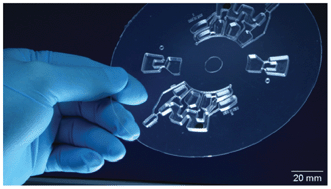 Graphical abstract: Centrifugal gas-phase transition magnetophoresis (GTM) – a generic method for automation of magnetic bead based assays on the centrifugal microfluidic platform and application to DNA purification