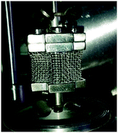 Graphical abstract: Fluorination of neodymium carbonate monohydrate with anhydrous hydrogen fluoride in a Carberry spinning-basket reactor