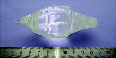 Graphical abstract: Single crystals of undoped Li2WO4 and Li2W1−0.0125Mo0.0125O4: formation enthalpies, heat capacity in the temperature range 320–997 K