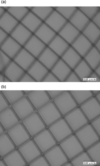 Optical micrograph of the grating with 20 µm spacing using chromophore 2. (a) Excitation wavelength: 755 nm; laser power: 5.0 mW with 1.8 µm width; (b) excitation wavelength: 820 nm; laser power: 3.0 mW with 2.4 µm width.