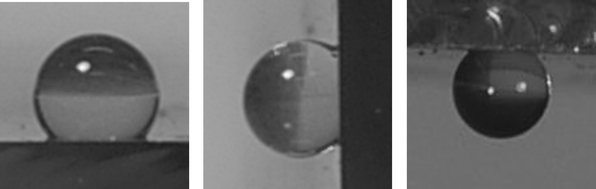 Water droplets (1 mg) on the tungsten selenide thin films. Left: water droplet on a film at 0° tipping angle; middle: water droplet at a 90° tilt angle; right: water droplet suspended upside down on the film. The water droplets contained a small amount of methylene blue dye to aid visualisation, this was not found to alter the contact angles on the droplet sizes used.