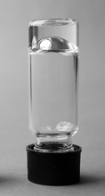 Photo of an aqueous suspension of 1 mg ml−1 Me2PE-C32-Me2PE (pH 5) in a vial turned upside down. An almost clear hydrogel is formed.