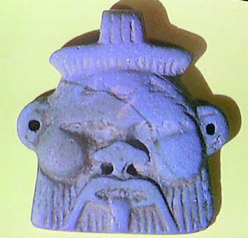 Amulet of the Egyptian dwarf god Bes (712–323 BC). Produced as a compact Egyptian Blue body in a two-stage process (see text).