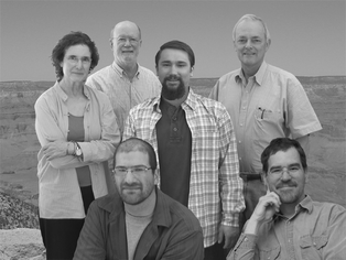 From left to right: back row: Ana L. Moore, Thomas A. Moore, Gary F. Moore, Devens Gust; front row: Michael Hambourger, David M. Kramer