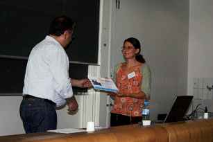 Christos Likos presents the 2009 Soft Matter award to Emanuela Zaccarelli.