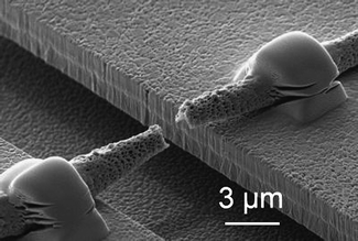 MEMS device to test individual polymer microfiber. A single fiber fractured is shown (credit: ©Fraunhofer IWM—Jaeger et al. (2009)).