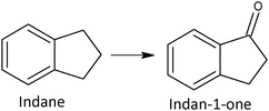 Oxidation of indane to indan-1-one.