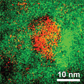 Energy filtered transmission electron microscope image of the piece of as-prepared glass co-doped with Ag nanoclusters and Yb3+ ions; red color represents Ag and green color Yb atoms, respectively.