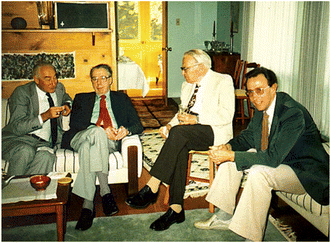 Discussing spectroscopy at Herzberg's home, ca. 1985. Left to right: Andy Cole (visiting from Perth, Down Under), Norman Jones, Gerhard Herzberg and Henry Mantsch (personal photograph).