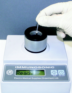 The Immunosonic instrument from Electro-Medical Supplies, based on the ultrasonic standing wave action on an immuno-agglutination assay. The sample was inserted into a glass capillary which was placed along the symmetry axis of a cylindrical ultrasonic resonator. The ultrasound was used to boost the bead–bead interaction by concentrating the beads into the pressure nodes of the ultrasonic standing wave. More detailed descriptions of the device design and operation are found in ref. 13 and 14.