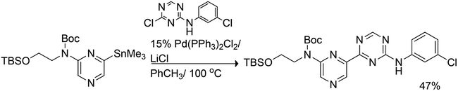 Bihetaryl Stille coupling of stannylated pyrazine with chlorotriazine.