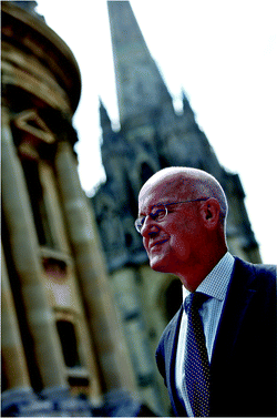 Professor Hamilton pictured in Oxford against a backdrop of the Radcliffe Camera and the University Church of St Mary the Virgin.