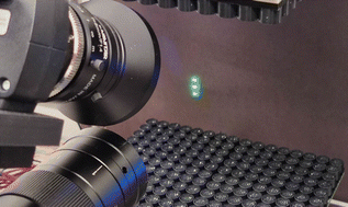 Graphical abstract: Acoustic levitation and manipulation of columns of droplets with integrated optical detection for parallelisation of reactions